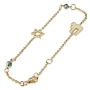 14K Yellow Gold Bracelet with Evil Eye, Chai and Star of David Charms - 1